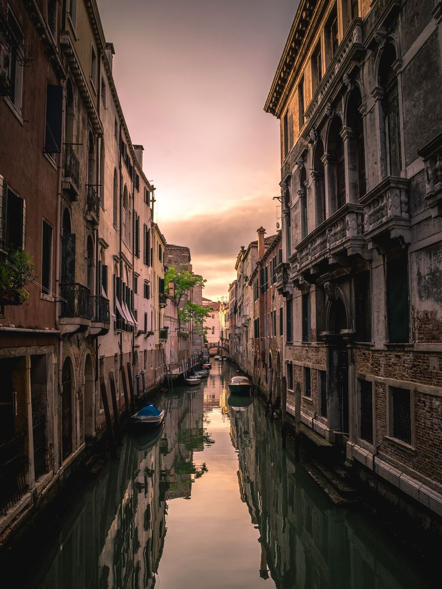 A quiet Venetian canal at sunset